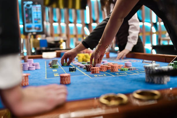Live blackjack table with English-speaking dealer and multi-camera interface
